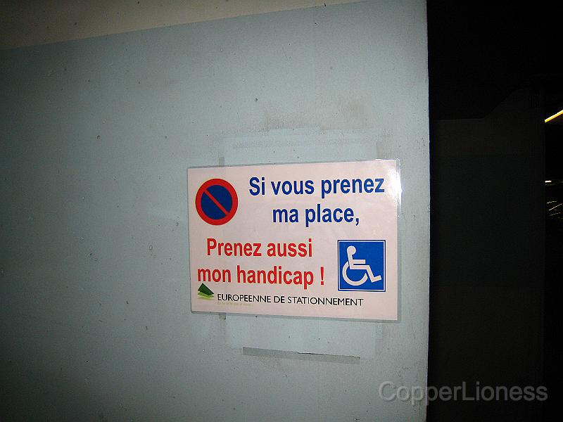 IMG_5050.JPG - I saw a similar sign in 2004 in France, and thought it a good guilt trip for those who take handicapped spots without being handicapped. It says, "If you take my place, please take my handicap too!"
