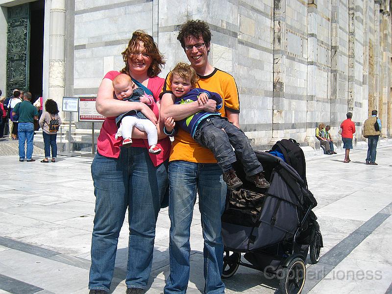 IMG_7035.JPG - Our family in front of the Pisa cathedral. Sprocket doesn't want to pose for pictures anymore.
